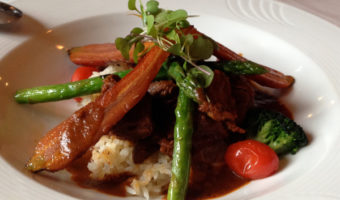 Alpaca adobo stew braised in chicha de jora with Peruvian chili peppers