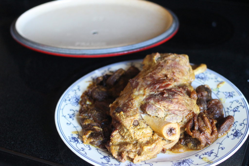 braised lamb shoulder bone-in with dried apricots and spices