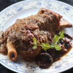 braised lamb shoulder bone-in with dried apricots and spices