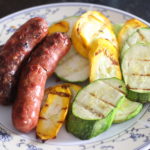 Lac Brome duck sausages with grilled zucchini