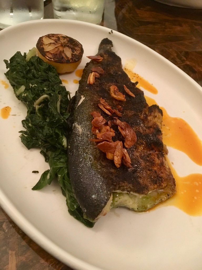 seared-trout-garlic-wilted-greens-tito-and-pep-menu-tucson